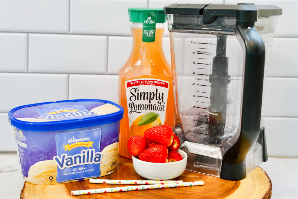 ingredients for strawberry frosted lemonade including vanilla ice cream and simply lemonade with strawberry